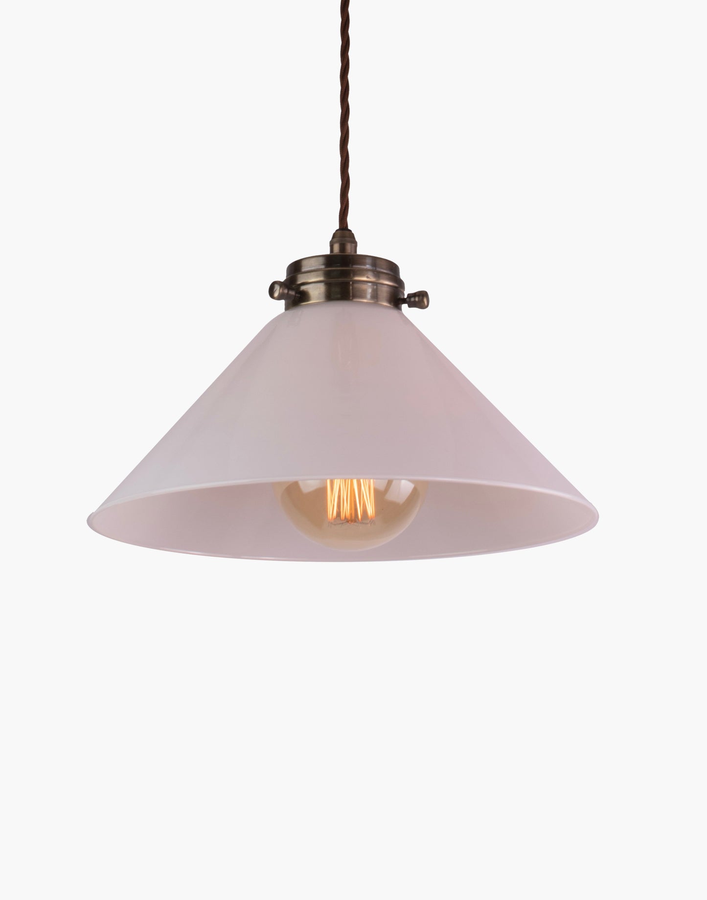 Pendant light in solid brass with classic silhouette, adjustable height, and refined transitional design for interior spaces