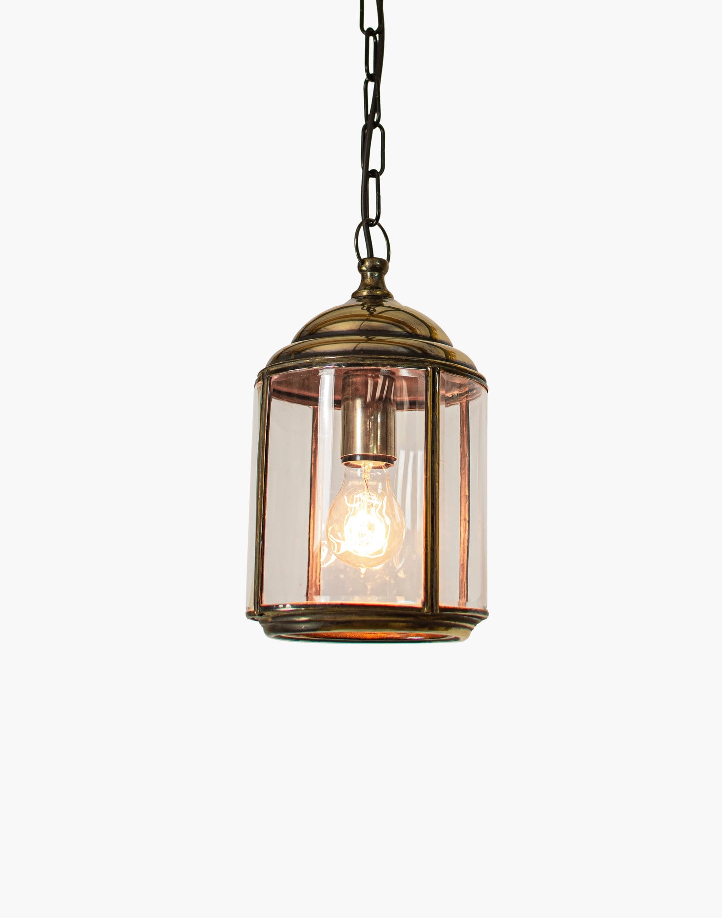 Solid brass pendant lantern with mouth-blown curved beveled glass, traditional porch hanging light with brass chain and ceiling rose.