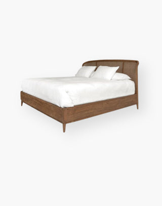 Rattan texture bed with teak bed frame and an airy cane pattern