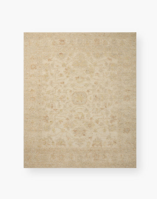 Hand Knotted Wool Rug with a raised texture with organic ivory and natural coloring.