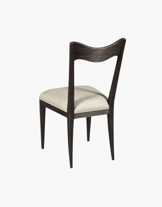 Four leg black curved crest rail flanked by tapering corner posts and upholstered cream seat