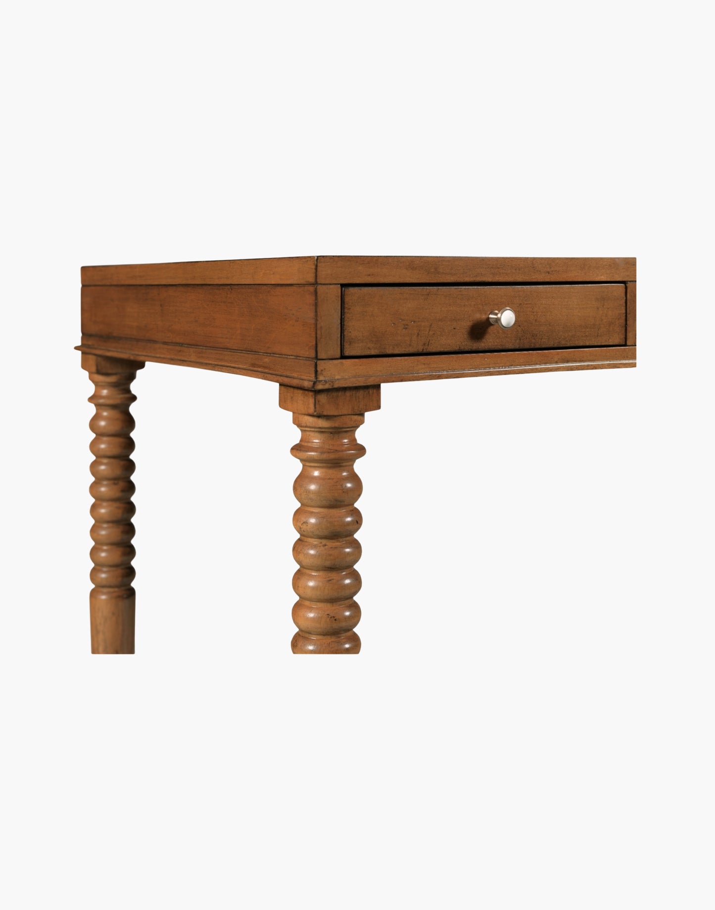 Writing Table Desk in Praline finish with rectangular top, turned flared legs, and three soft-close drawers with brass hardware.