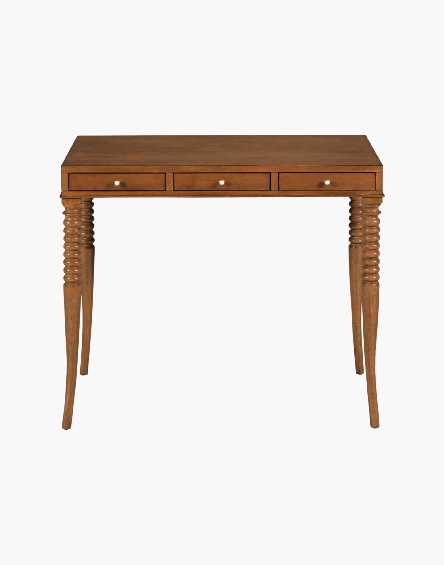 Writing Table Desk in Praline finish with rectangular top, turned flared legs, and three soft-close drawers with brass hardware.