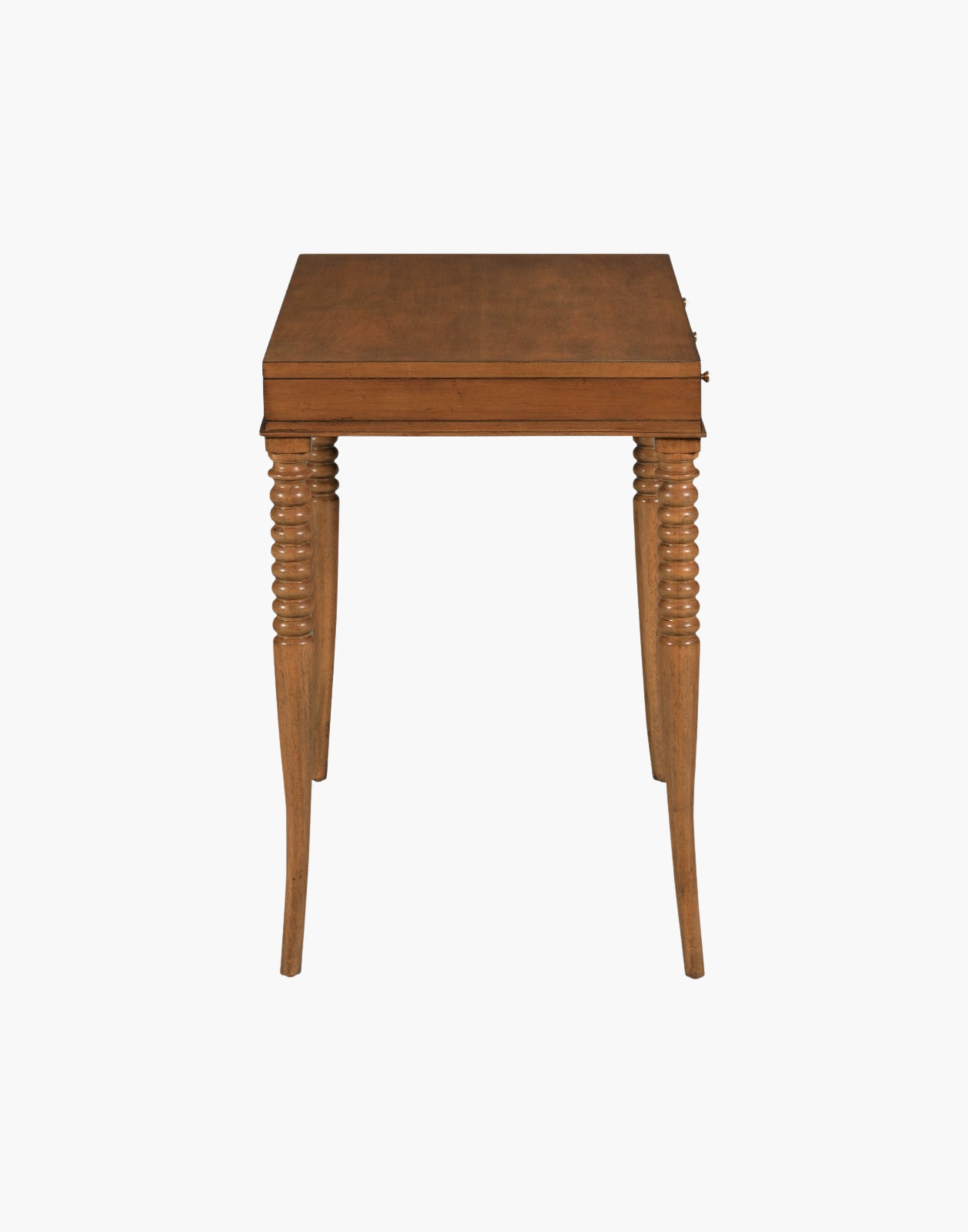 Writing Table Desk in Praline finish with rectangular top, turned flared legs, and three soft-close drawers with brass hardware.