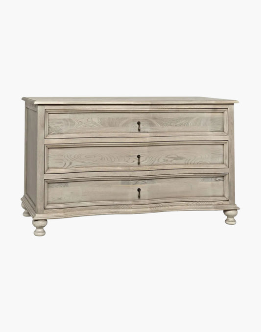 Curved elm chest with vintage grey finish, turned ball feet, and brass hardware, elegant classic modern design