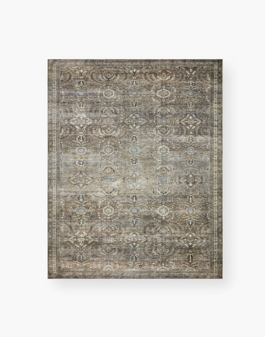 Layla Collection power-loomed polyester rug with classic color palette and subtle patina
