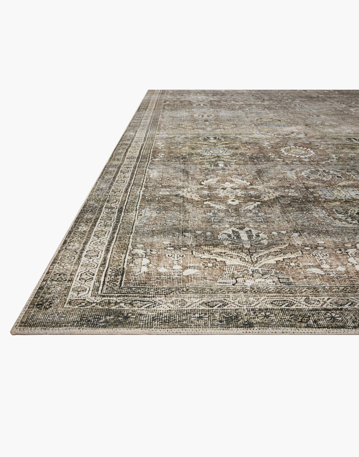 Layla Collection power-loomed polyester rug with classic color palette and subtle patina
