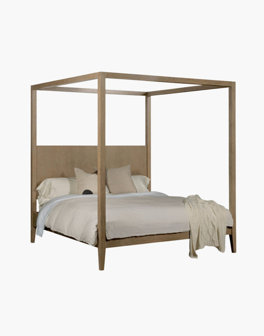 canopy bed with oak veneered headboard and tapered wood feet