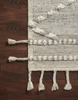 Light Grey and Ivory wool and cotton fringed rug.
