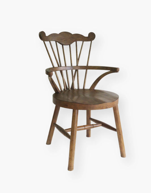 Dining Chair with top detailing and hooped arms layered on top of a saddle seat.
