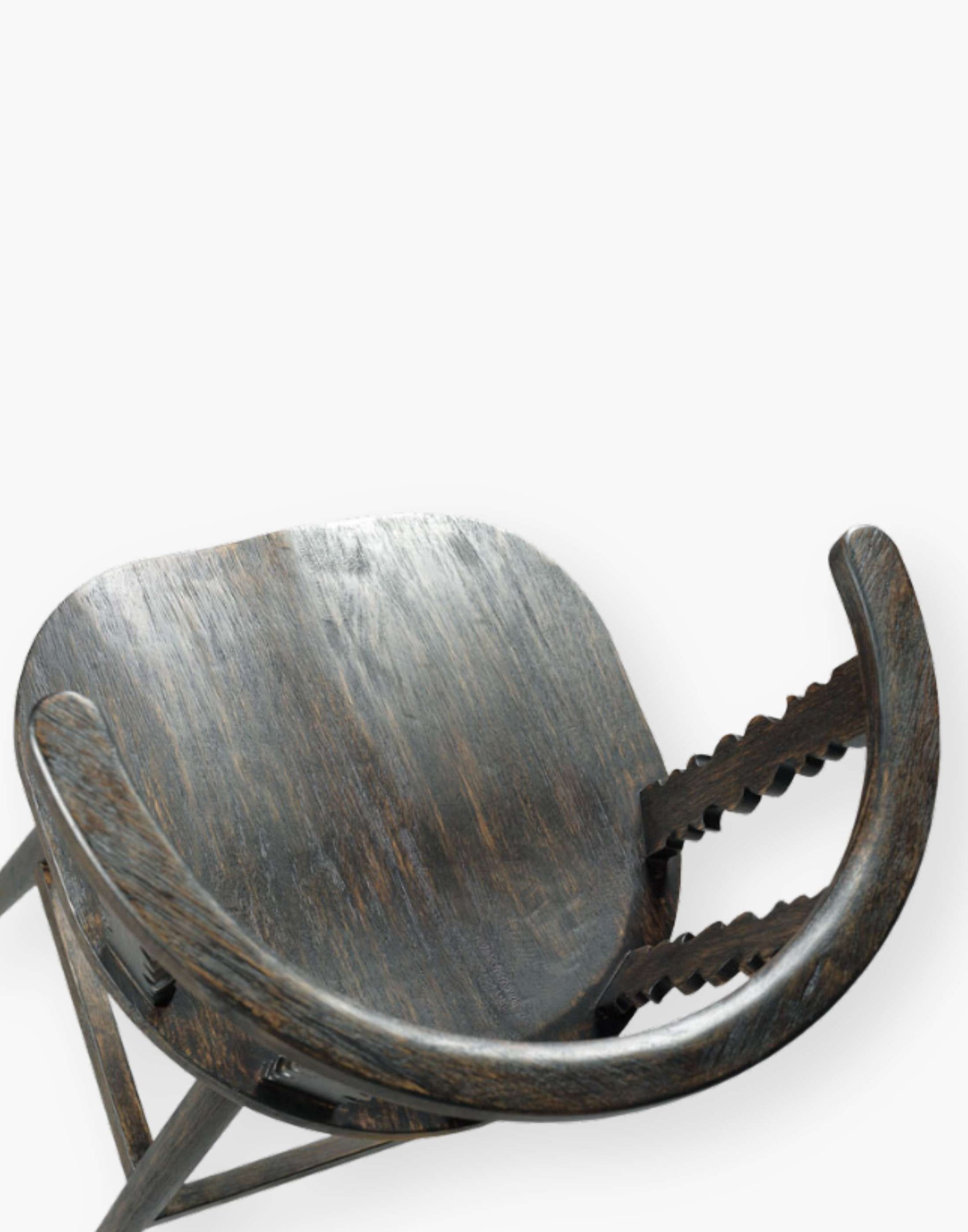 Counter stool with spindle detailing, inspired by 18th-century classics, made from hardwood solids in a warm black finish.