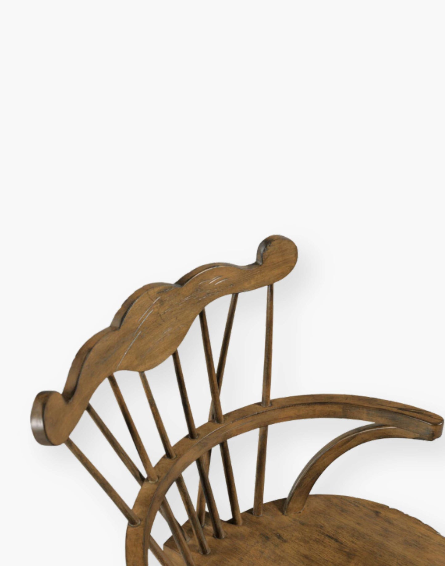 Dining Chair with top detailing and hooped arms layered on top of a saddle seat.