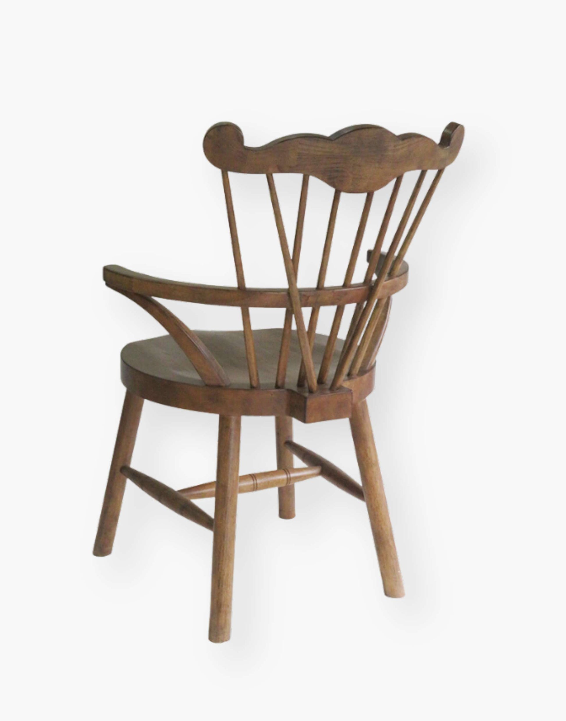 Dining Chair with top detailing and hooped arms layered on top of a saddle seat.