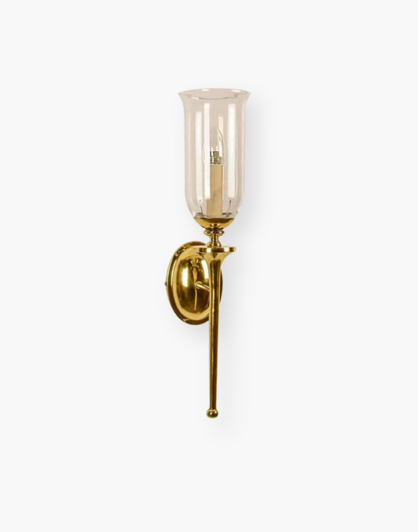Single wall sconce in solid cast brass with storm glass, elegant brass wall light for mirrors and hallways.