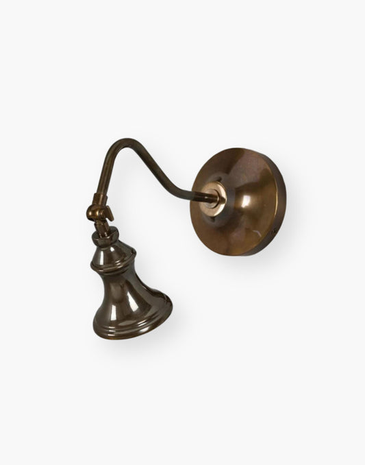 Vintage Adjustable Wall Spotlight in Antique Brass. Illuminate Your Space with Traditional Charm.