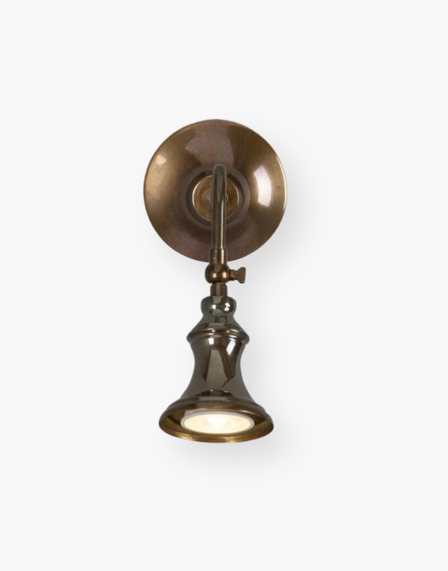 Vintage Adjustable Wall Spotlight in Antique Brass. Illuminate Your Space with Traditional Charm.