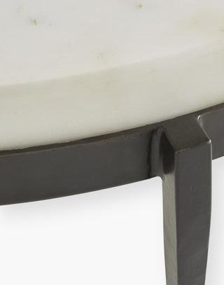 COFFE TABLE WITH HAND-FORGED BLACK IRON TAPERED LEGS ARE THE BASE FOR THE CHUNKY WHITE MARBLE TOP.