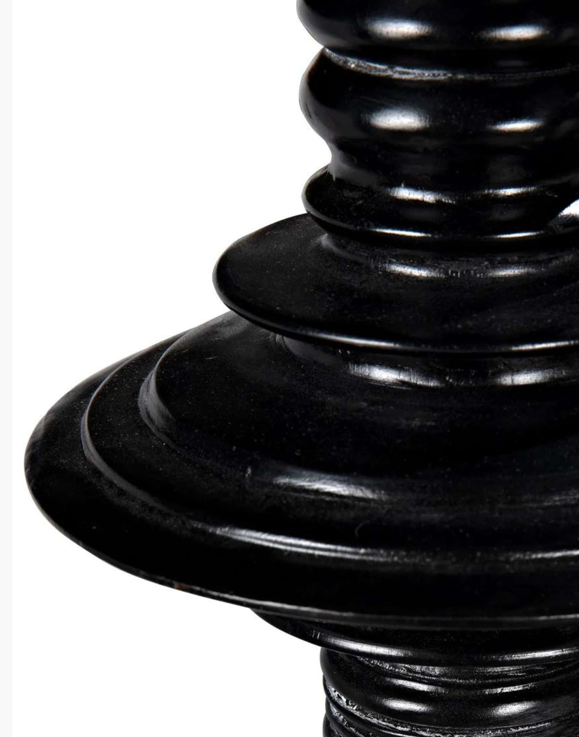 Mahogany, hand-rubbed black bed with intricate details on each post.