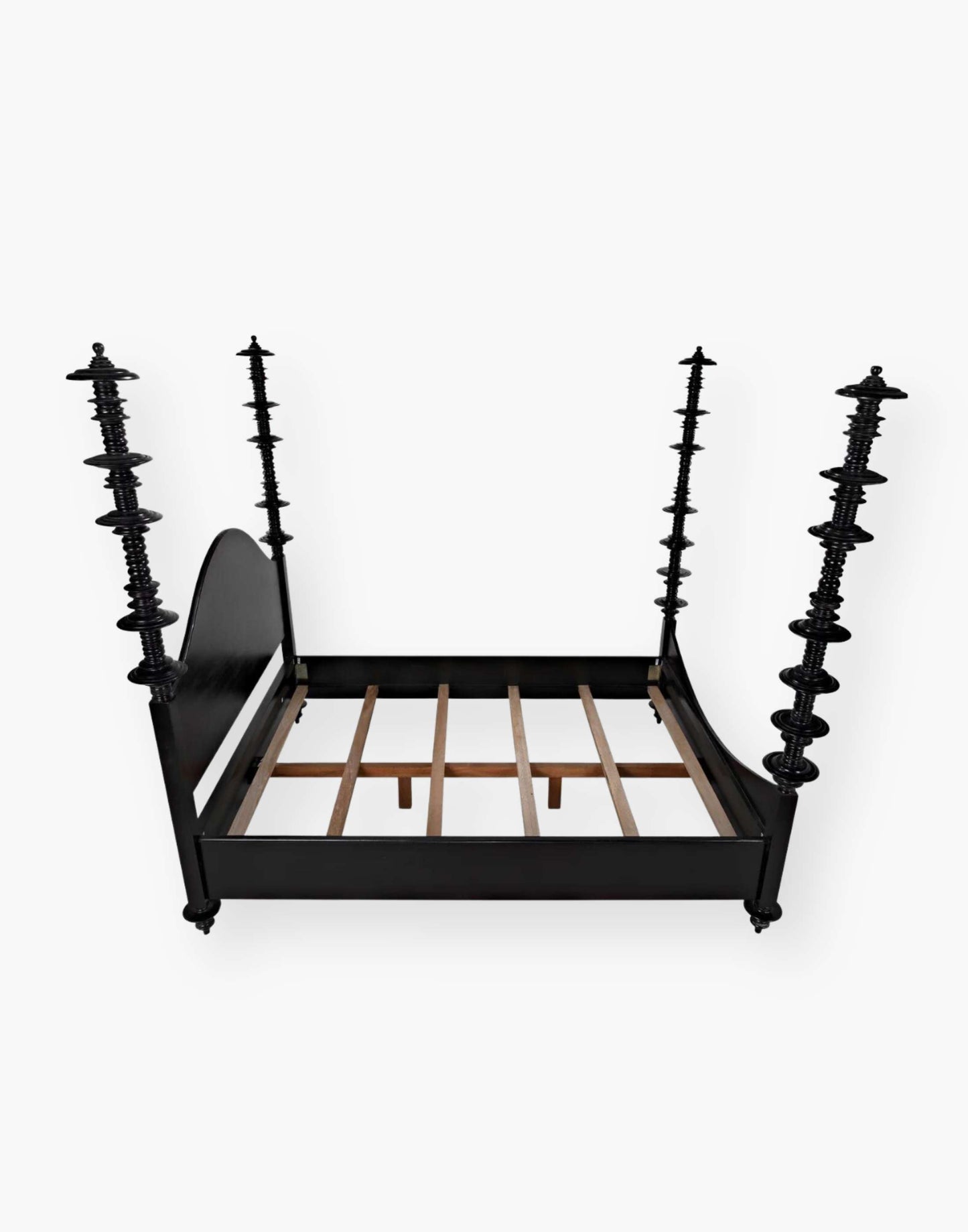 Mahogany, hand-rubbed black bed with intricate details on each post.