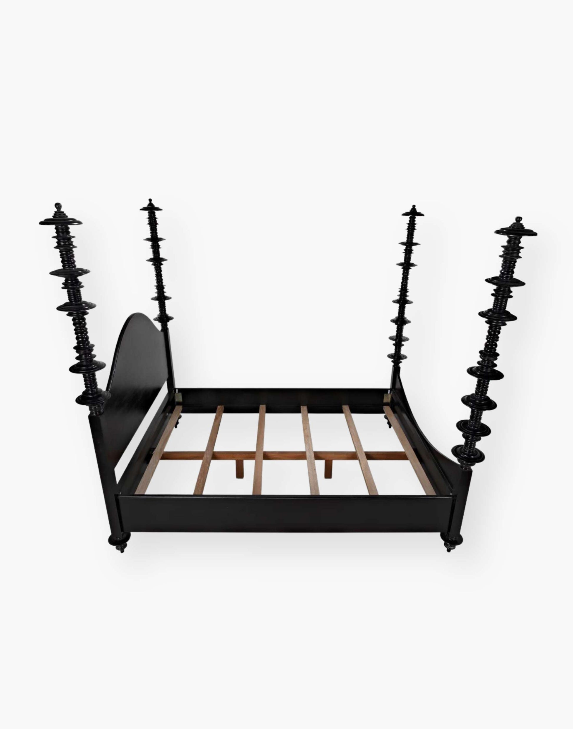 Mahogany, hand-rubbed black bed with intricate details on each post.