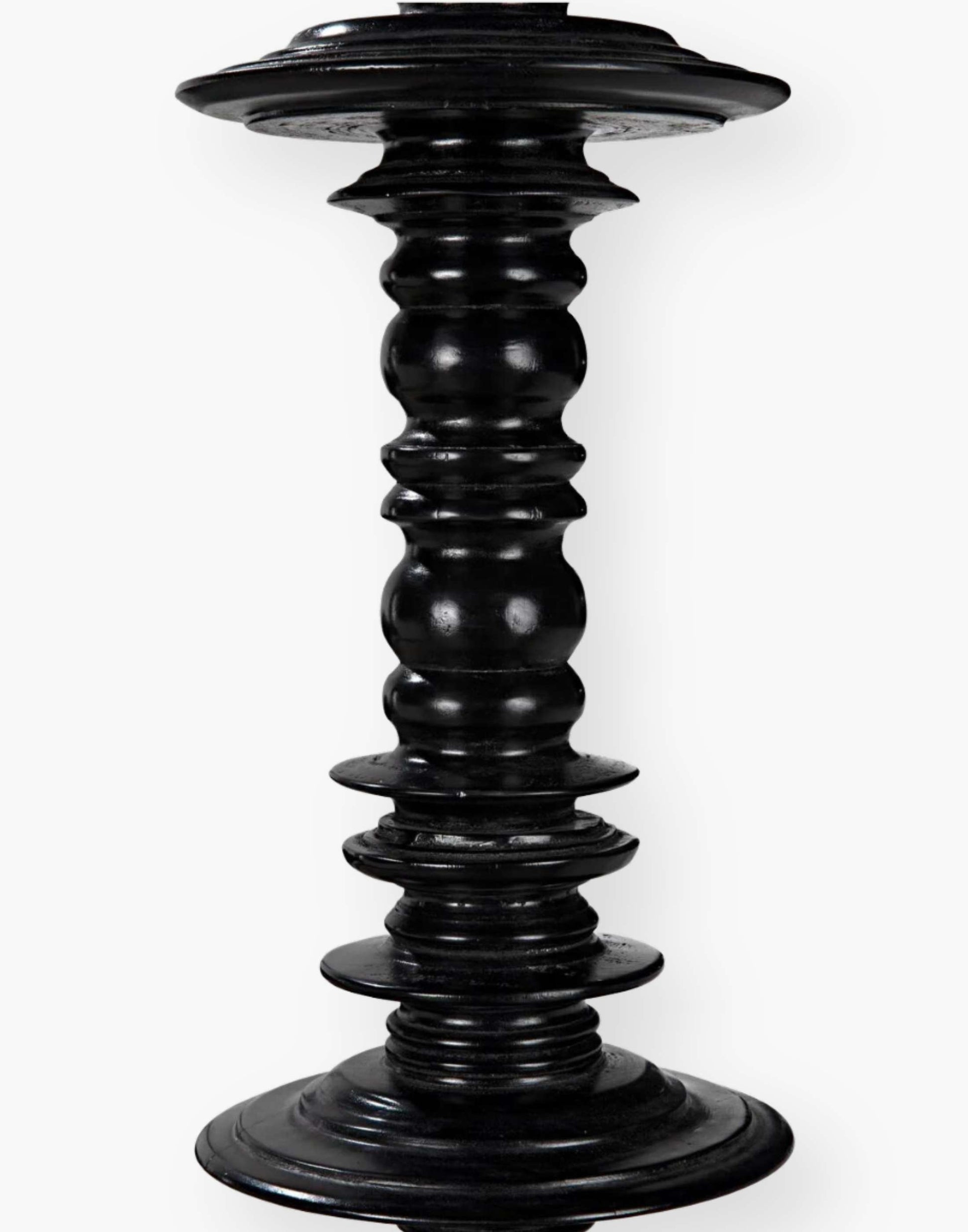 Mahogany, hand-rubbed black bed with intricate details on each post.