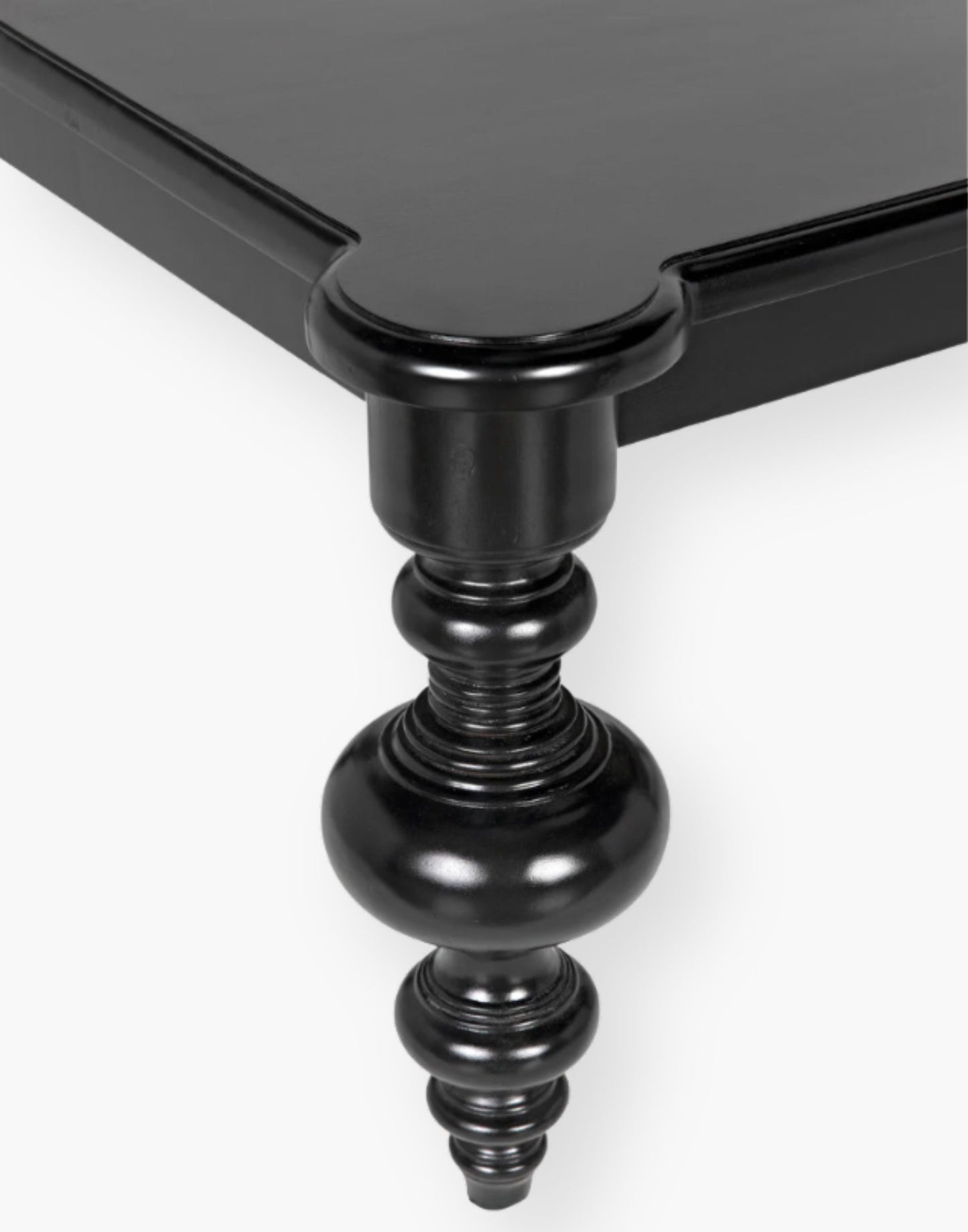 A Mahogany and Veneer Coffee Table with a Hand Rubbed Black Finish.