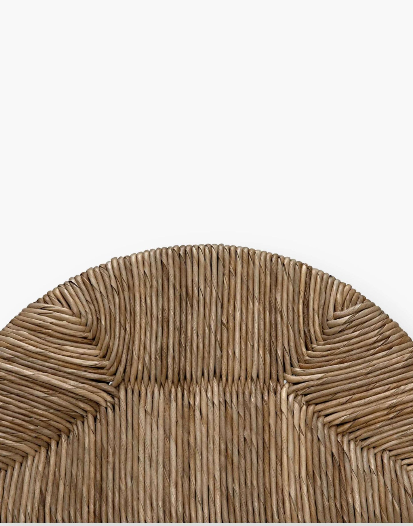 A stunning dining room chair with natural teak paired with seagrass.