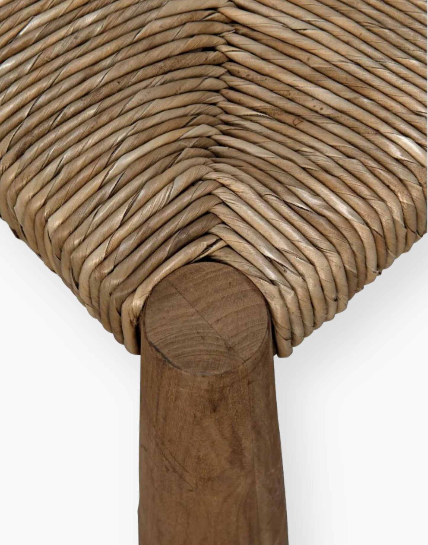 A stunning dining room chair with natural teak paired with seagrass.