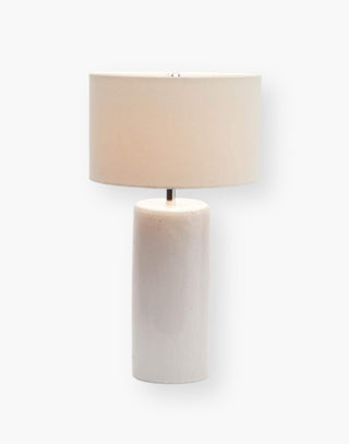 Hand glazed ceramic table lamp in rustic white with a linen drum shade.