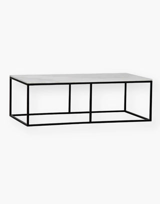 rectangle coffee table with quartz top supported by black simple metal frame