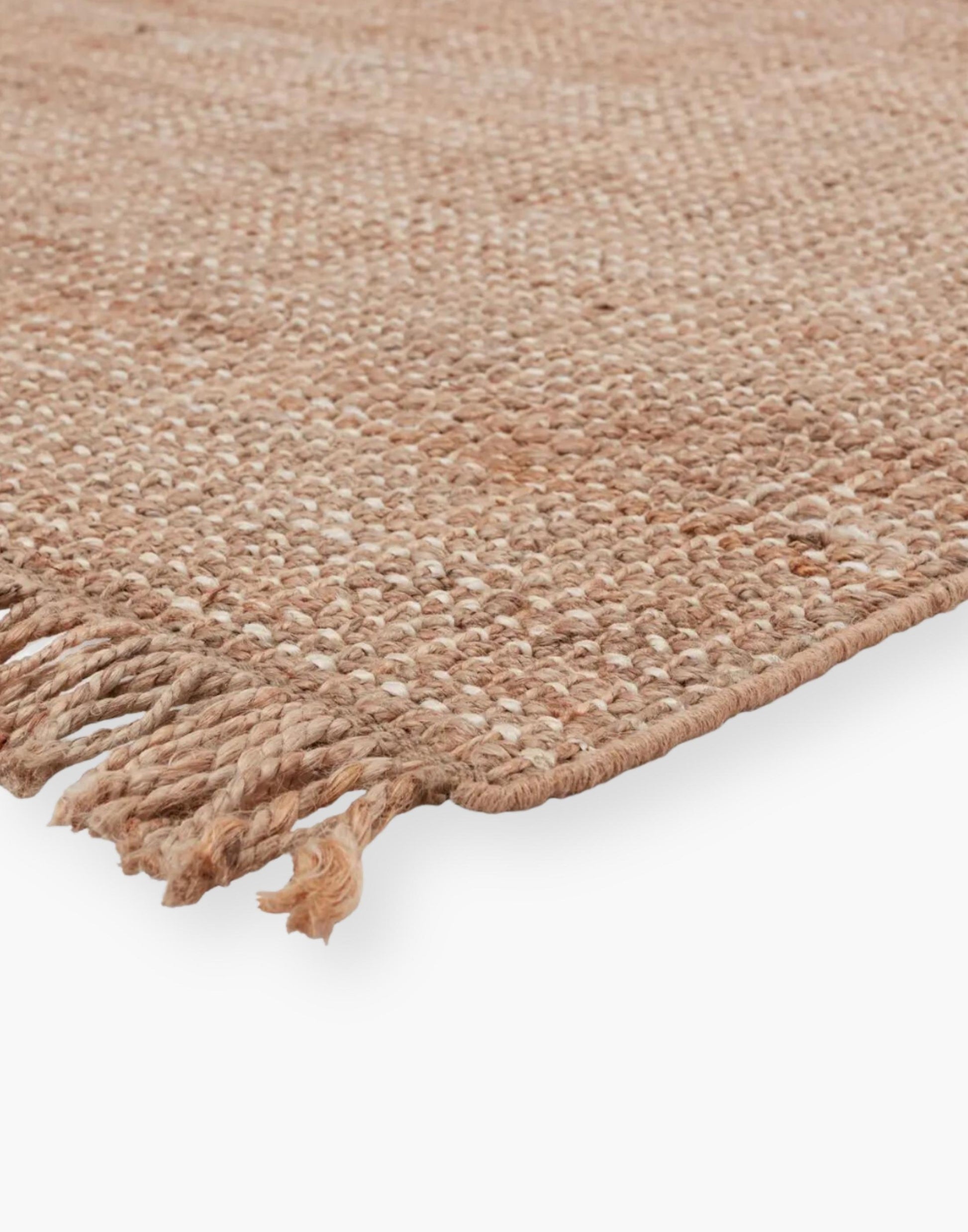 Jute rug with a texture-rich chunky weave, with a casually elegant layer lends an earthy accent in a duo-toned ivory and beige colorway with a knotted fringe.