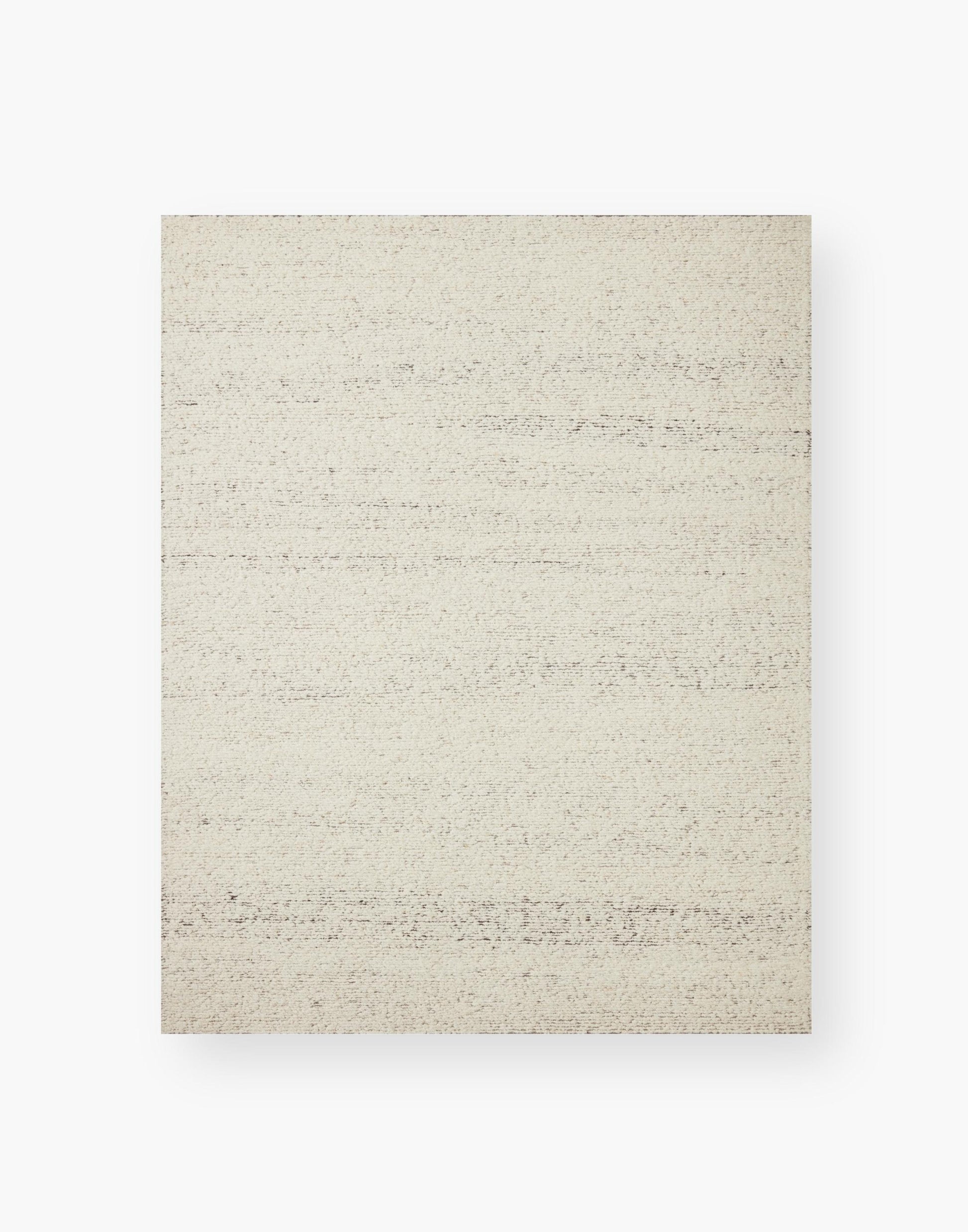 Hand Knotted Rug with Silver and Natural Colors.