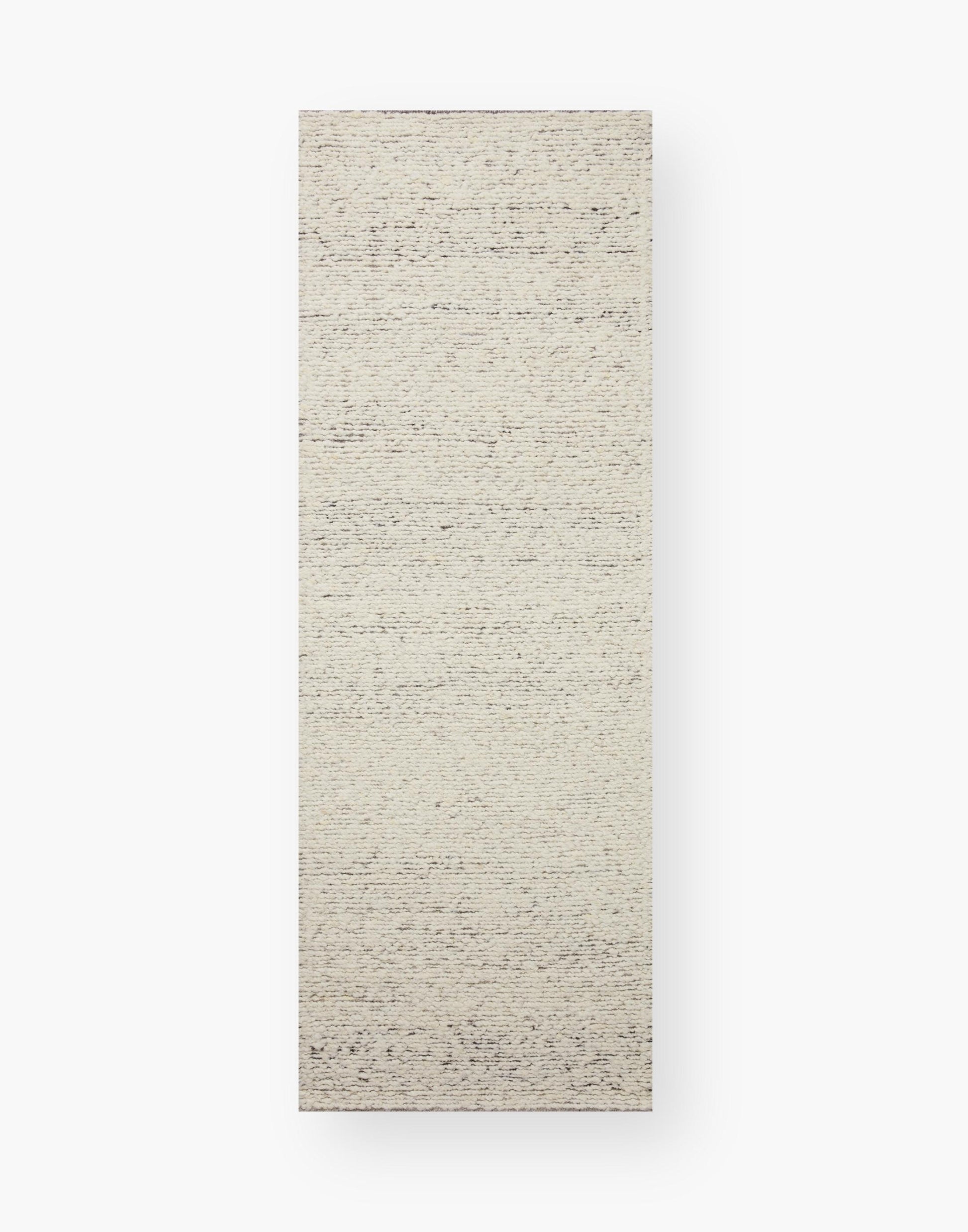 Hand Knotted Rug with Silver and Natural Colors.