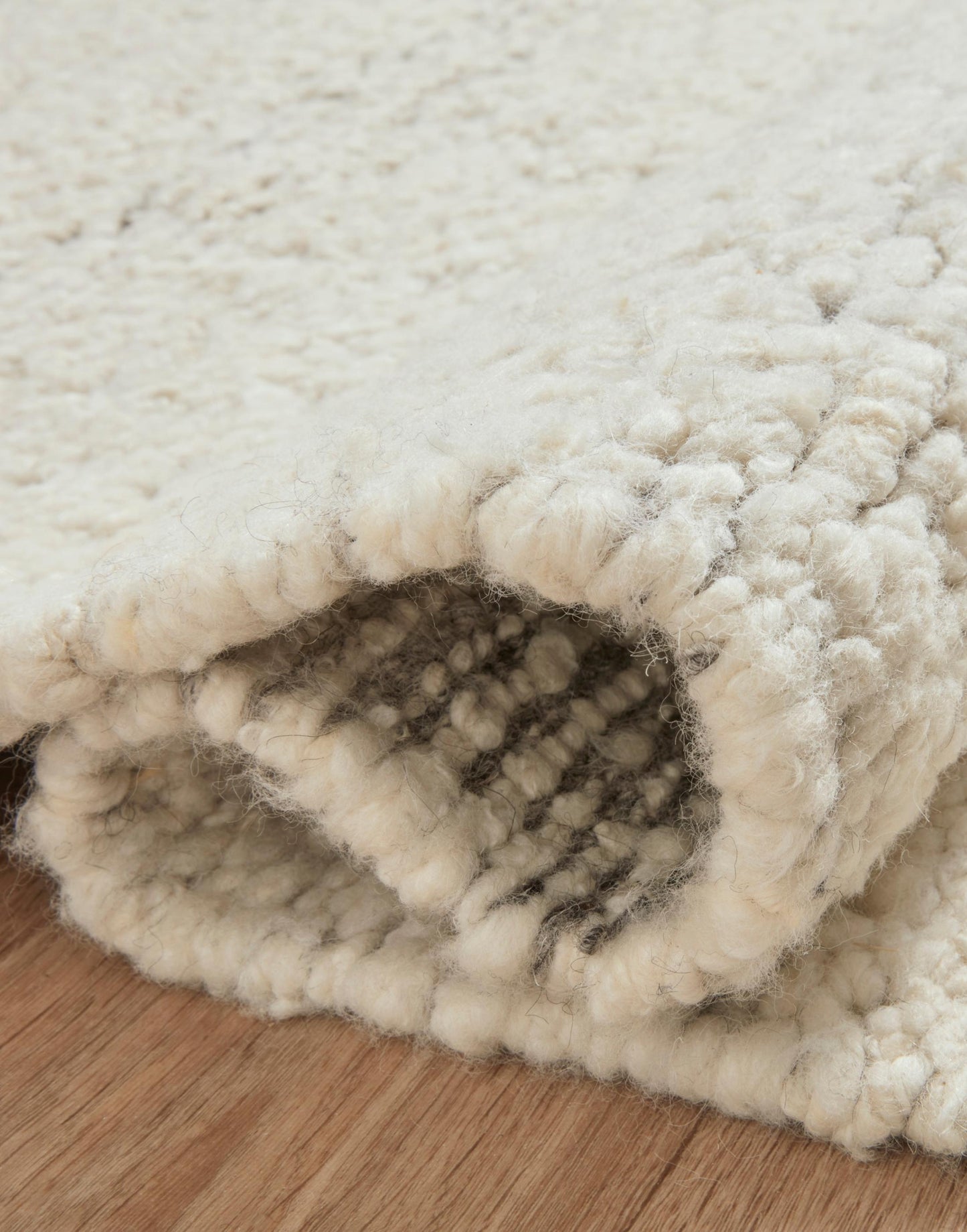 Hand Knotted Rug with Silver and Natural Colors.