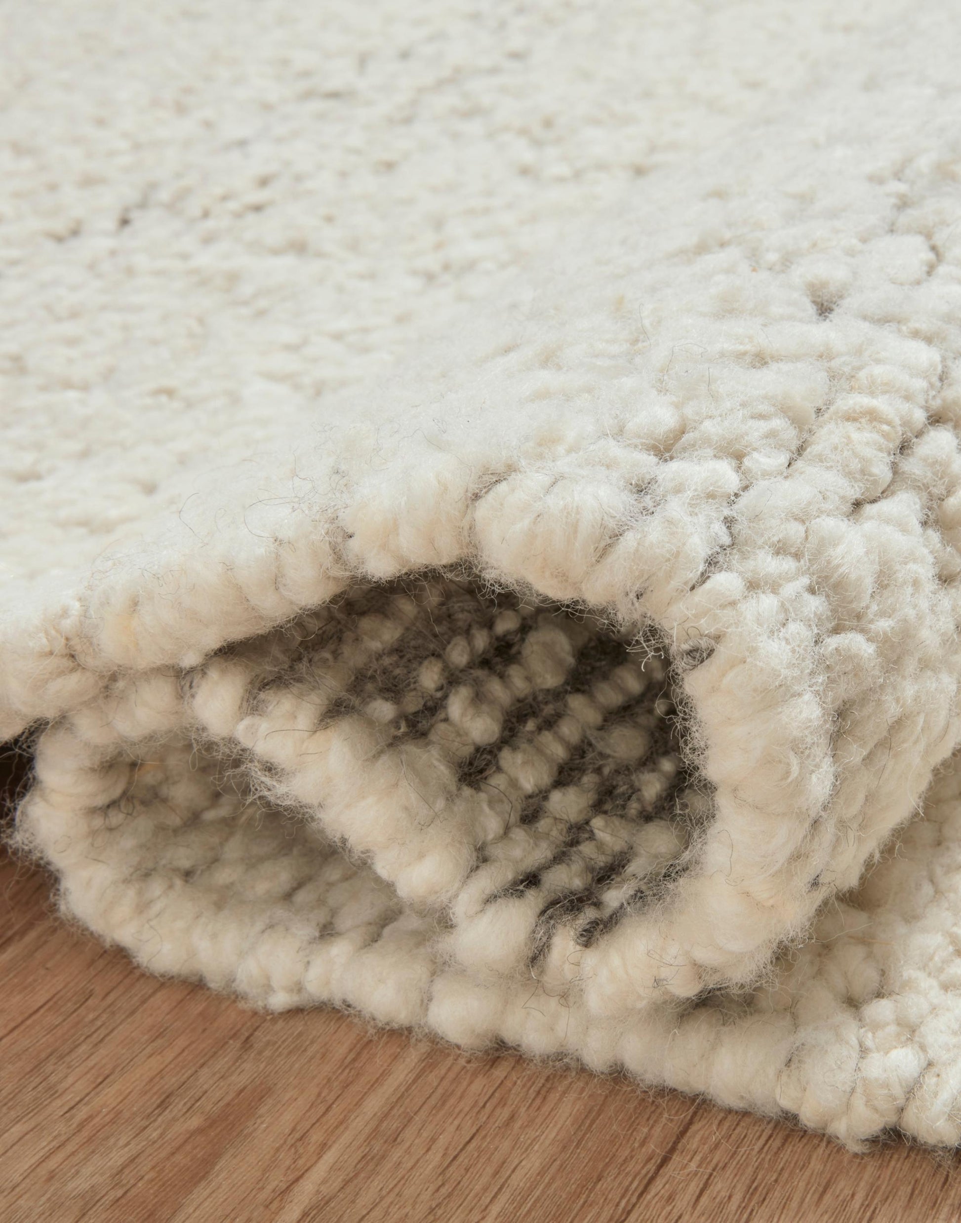Hand Knotted Rug with Silver and Natural Colors.
