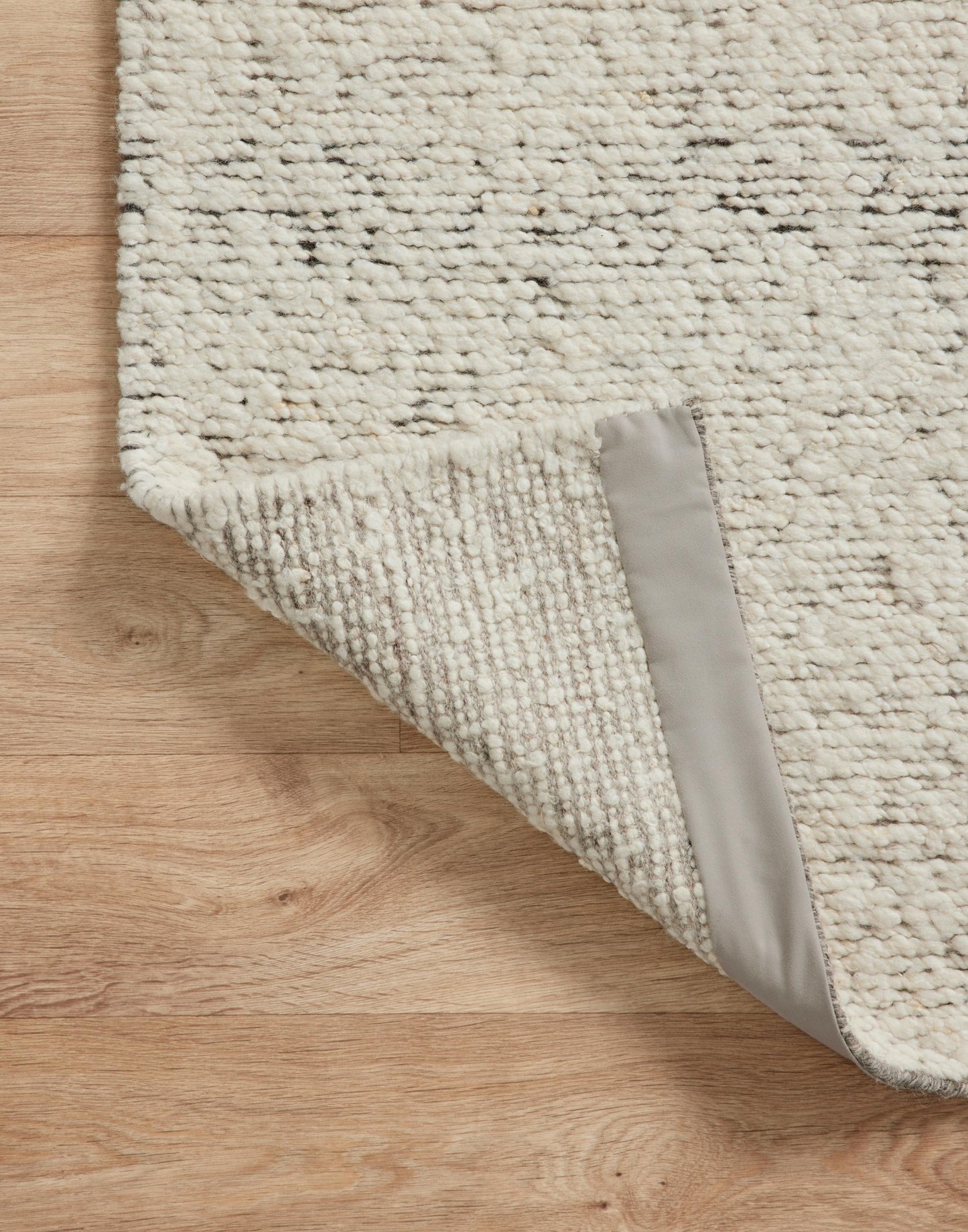 Hand Knotted Rug with Silver and Natural Colors.