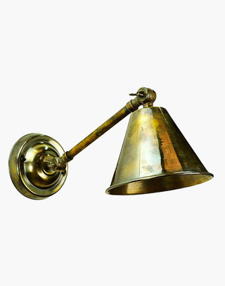 Map Room Single Adjustable Wall Light in Antique Brass. Vintage-inspired design with dimmable LED bulbs for focused illumination. Ideal for bedrooms or reading areas.