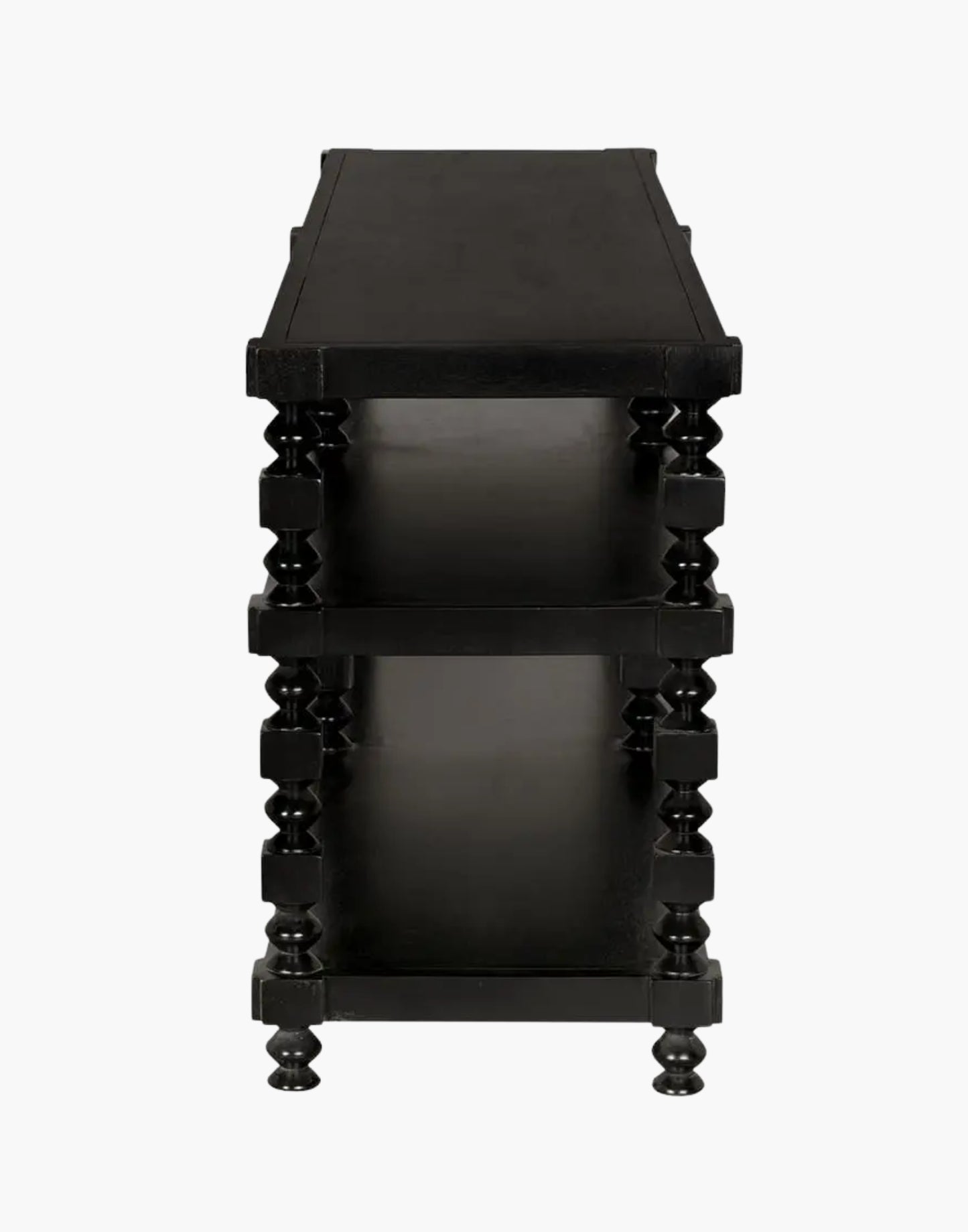 Transitional console table with black finish and open storage shelves in living room setting