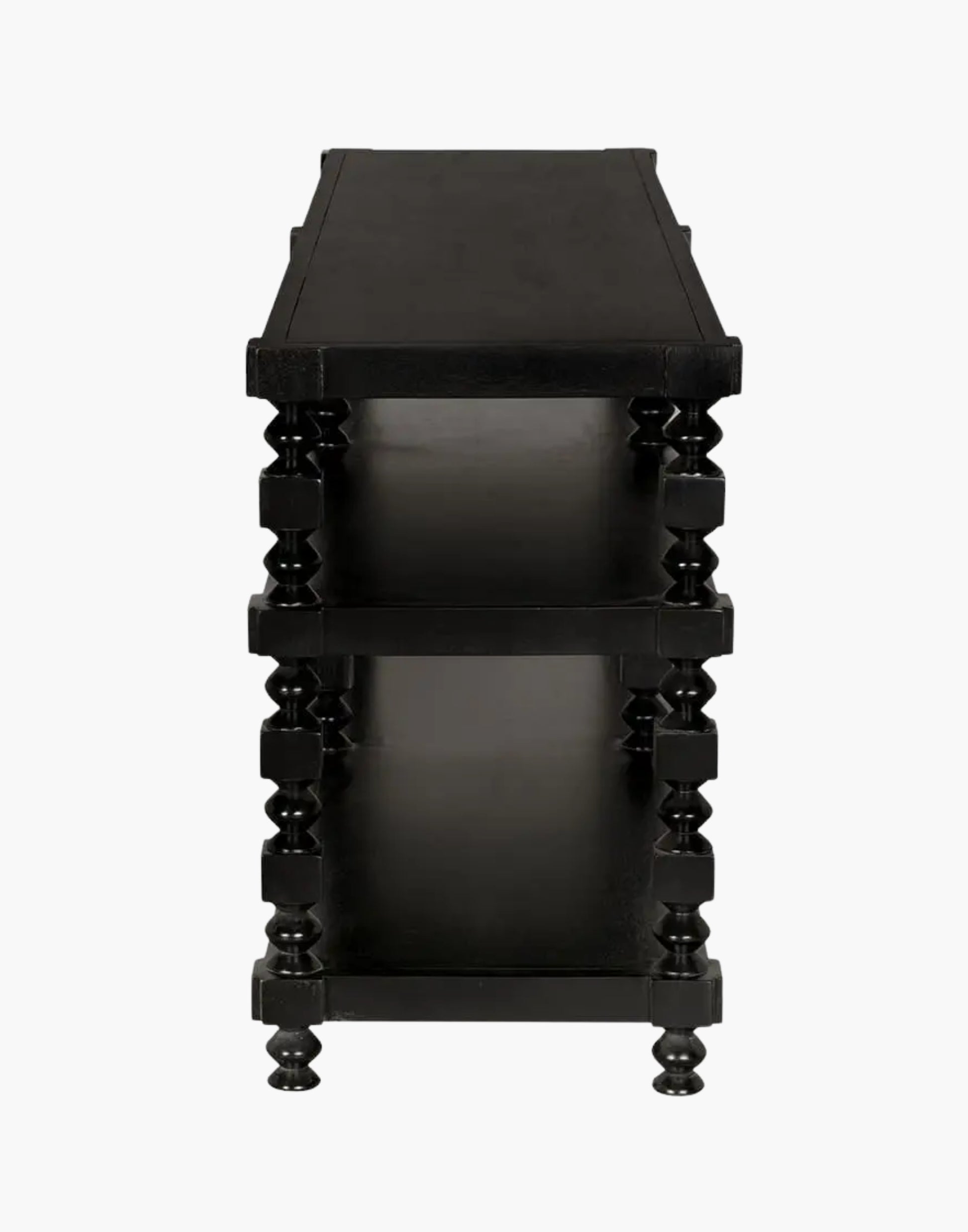 Transitional console table with black finish and open storage shelves in living room setting