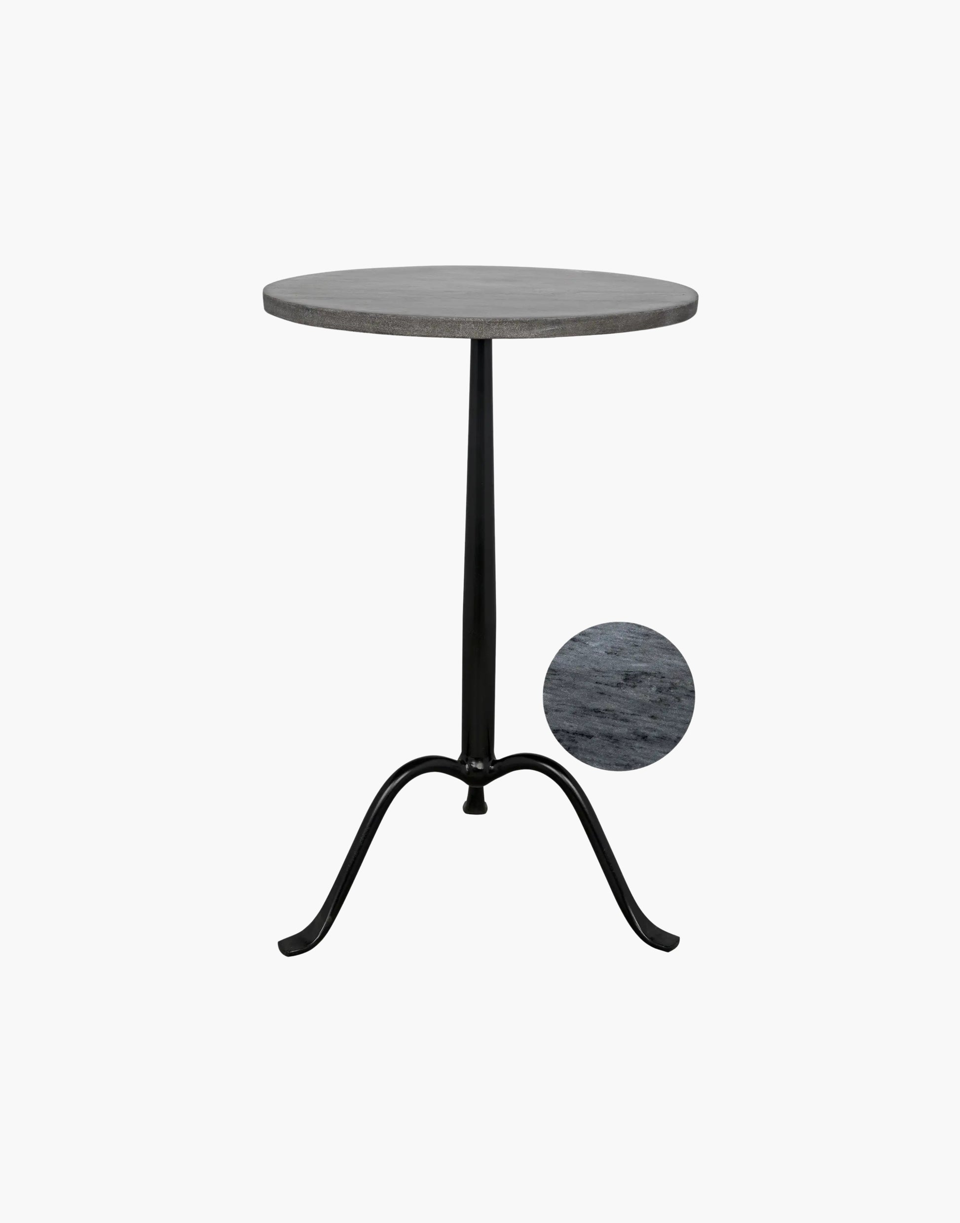 Tripod side table with matte black iron base and round black marble top, minimalist modern design