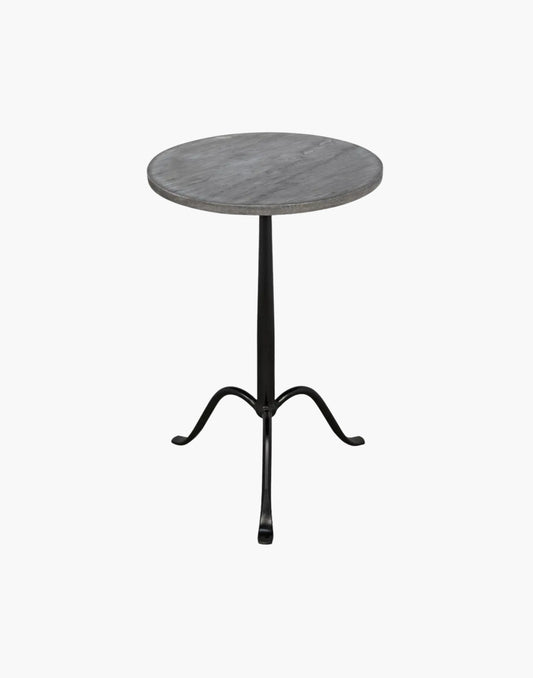 Tripod side table with matte black iron base and round black marble top, minimalist modern design