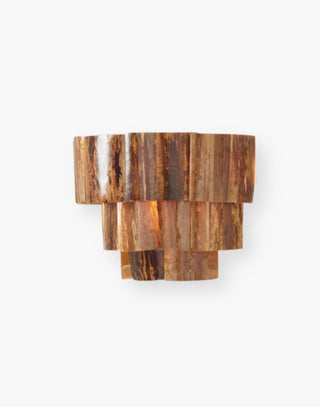 Organic and chic three-tiered piece sconce is handmade of banana bark layers coated in resin.