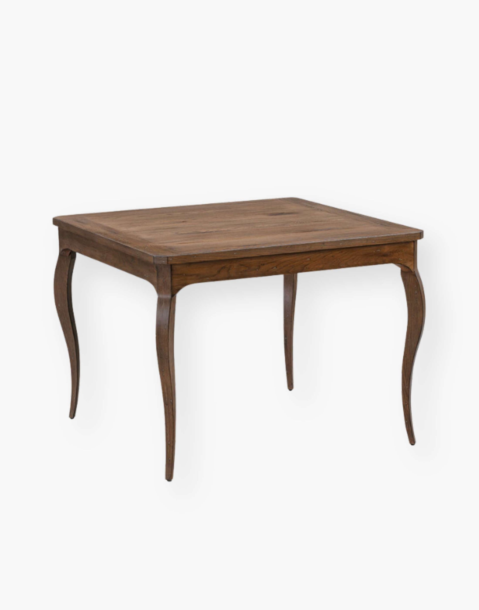 Oak solid and veneer game table with shaped cabriole legs that are joined by shaped apron rails below a squared top with canted corners.