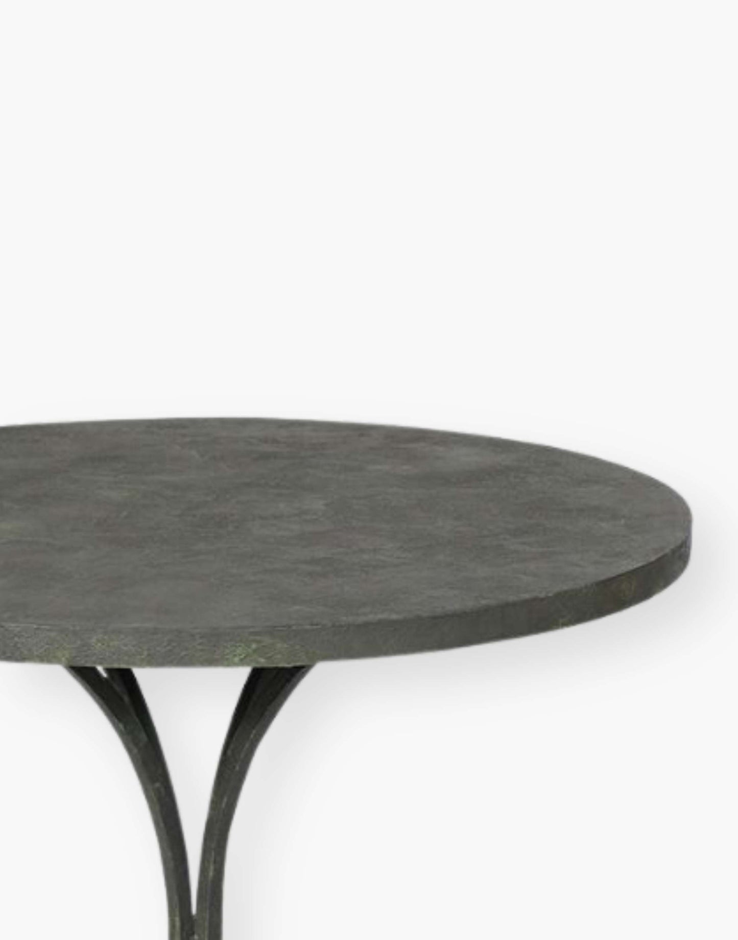 18th century French inspired guéridon with a honed metal top over four shaped metal legs.