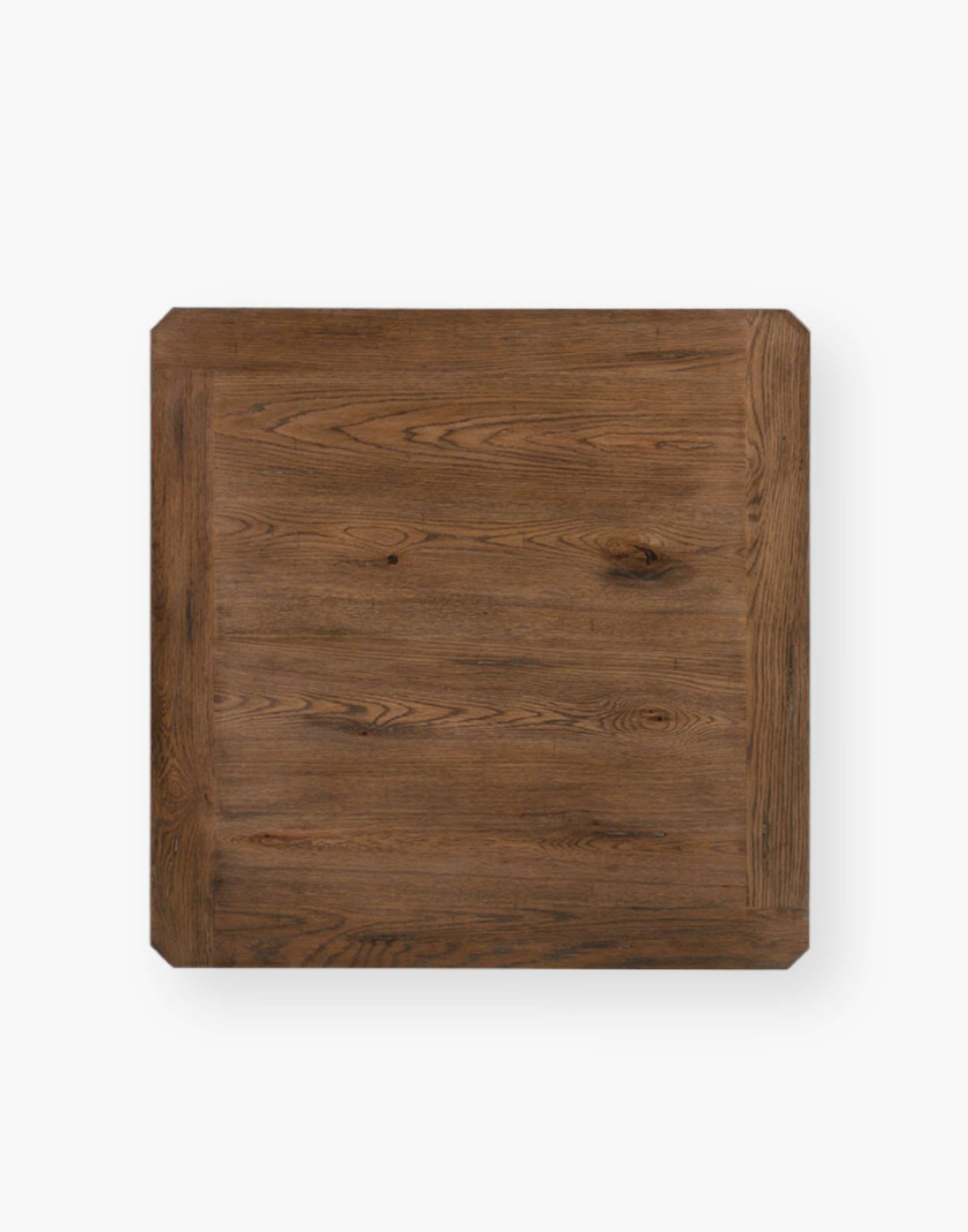 Oak solid and veneer game table with shaped cabriole legs that are joined by shaped apron rails below a squared top with canted corners.