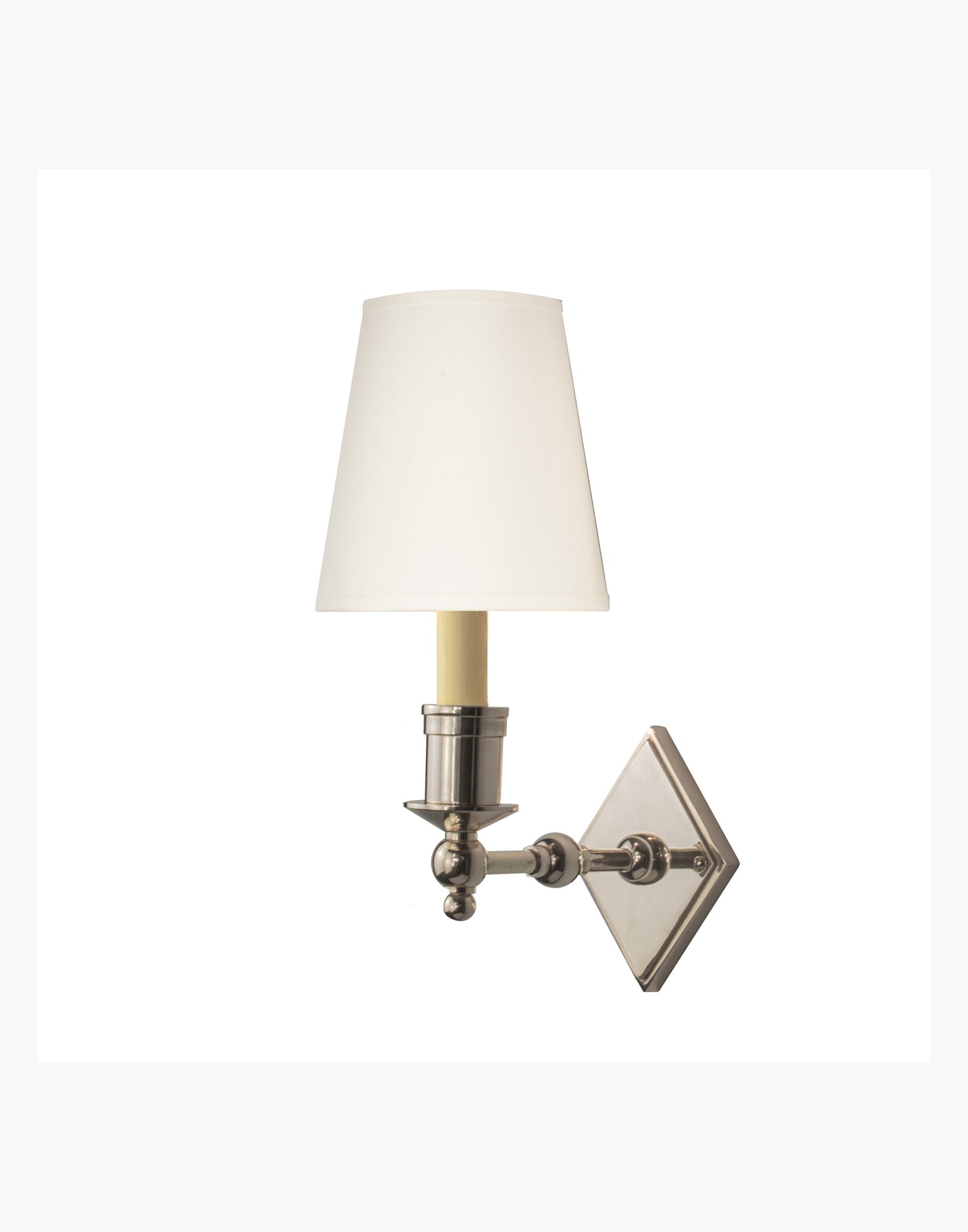 Brass wall sconce with diamond-shaped scalloped backplate and optional shade, cast and machined brass wall light.