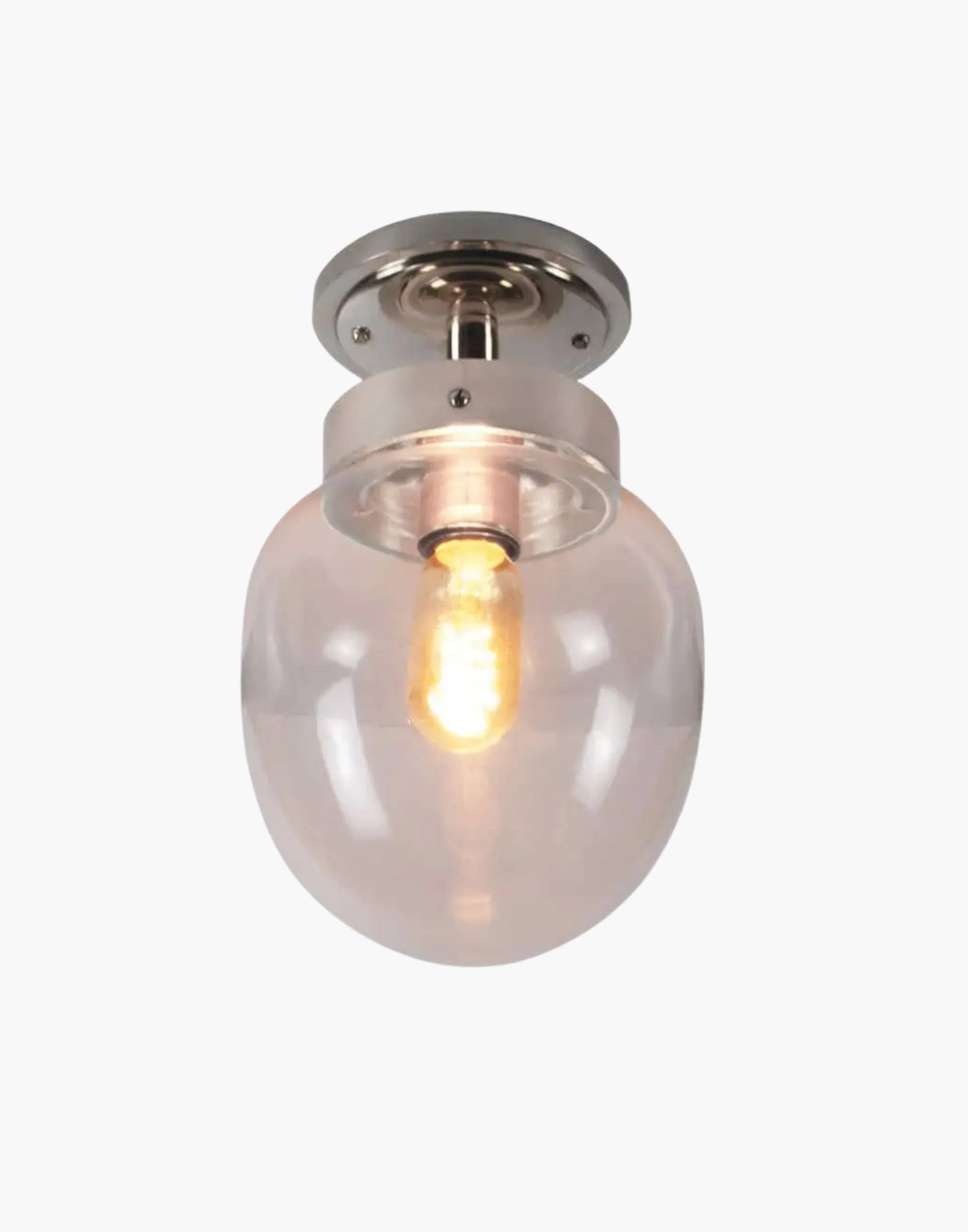 Charleston Flush Light in solid brass with mid-century design, available in five finishes with clear or opal glass. IP44-rated for Zone 2 bathrooms and covered outdoor areas.