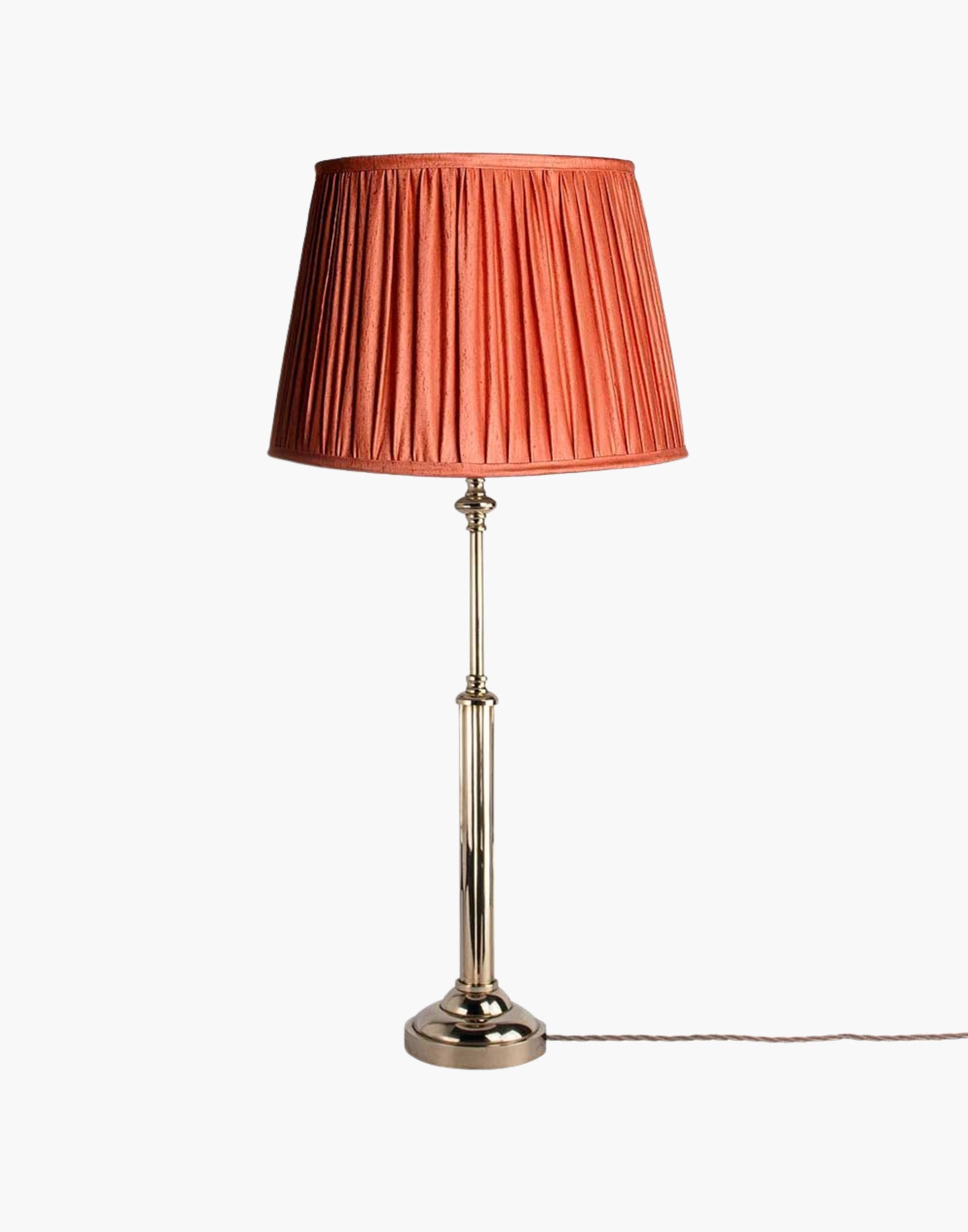 Brass table lamp with fluted stem and cast ball detail, colonial-style table lamp available with or without shade.