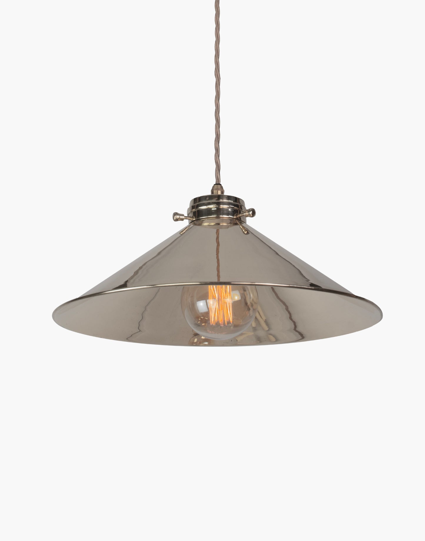 Brass pendant light with adjustable height and silk flex, focused illumination for kitchen islands and interior spaces