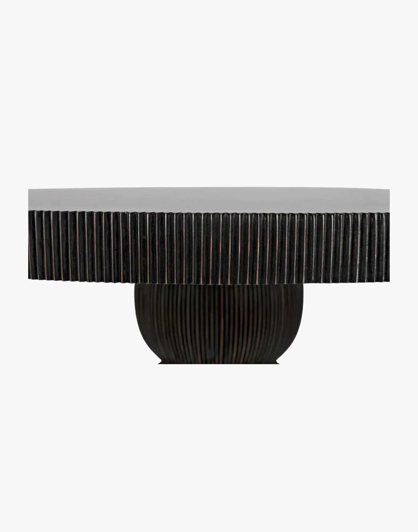 Round black mahogany dining table with ribbed sculptural base and light brown highlights, modern transitional design